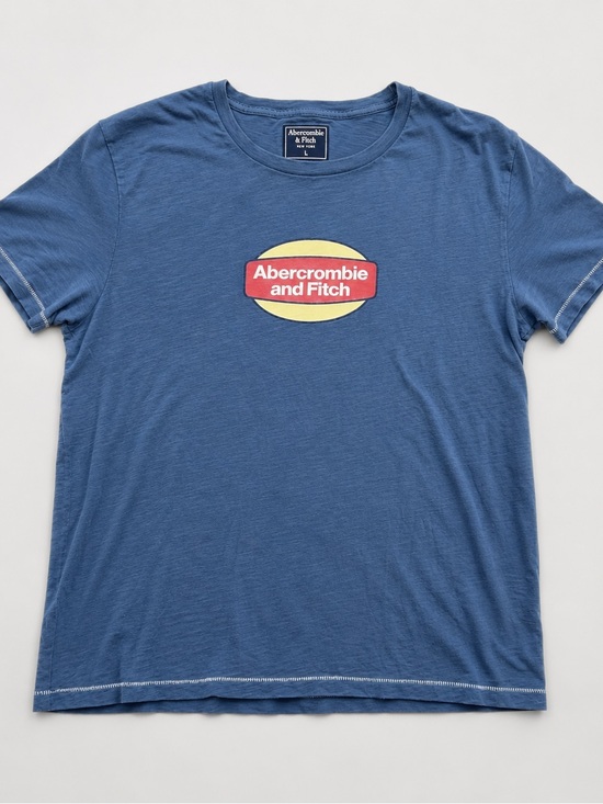 Abercrombie & Fitch Tops - Abercrombie & Fitch Women’s Blue Short-Sleeve Tee with Red and Yellow Logo